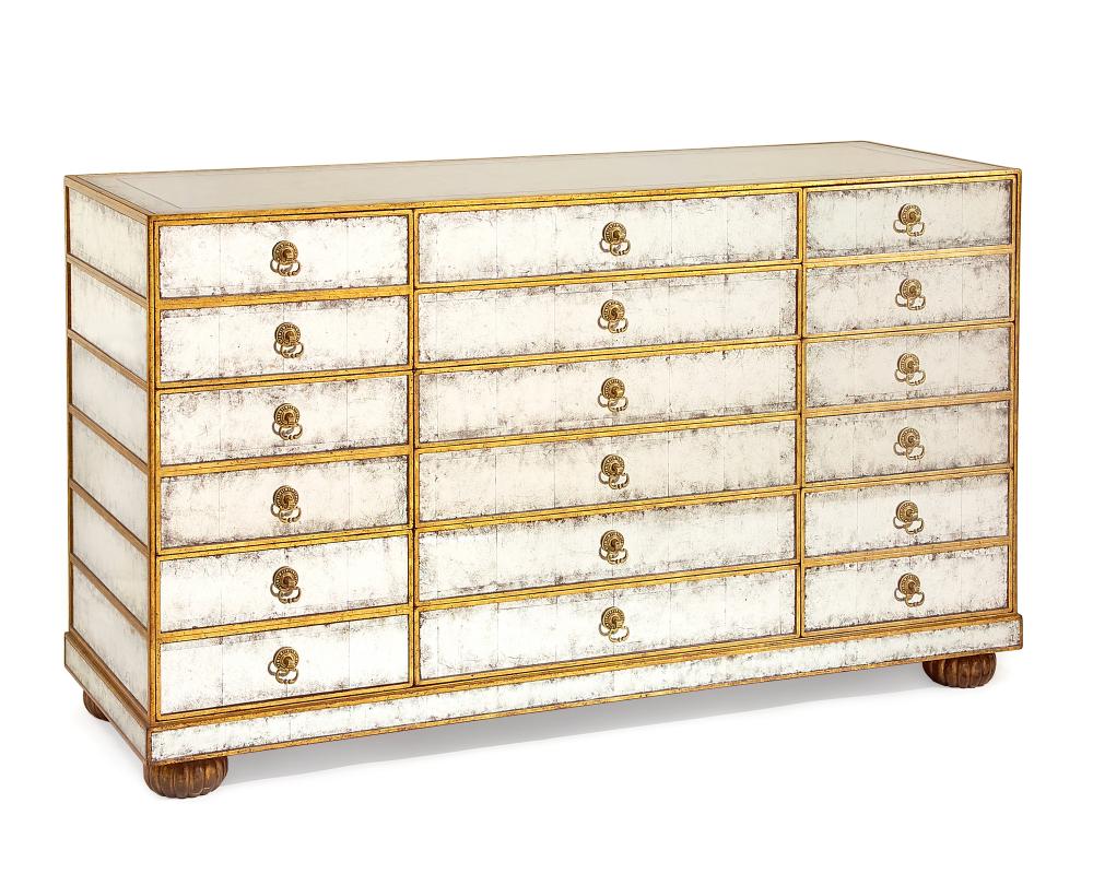 Aged Eglomise Chest. Twelve drawer chest with antique gold leaf accents and brass loop hardware.