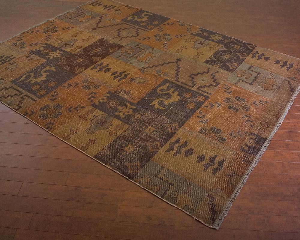 HAND WOVEN PATCHWORK TRIBAL RUG LOOKS LIKE AN ANTIQUE RUG.  TRANSITIONAL IN MUTED RED,GREEN, GOLD AN
